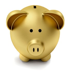 Golden piggy bank isolated over a white background